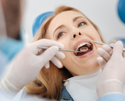 Gum disease warning signs and treatment at Elevate Smiles Dental in Tampa