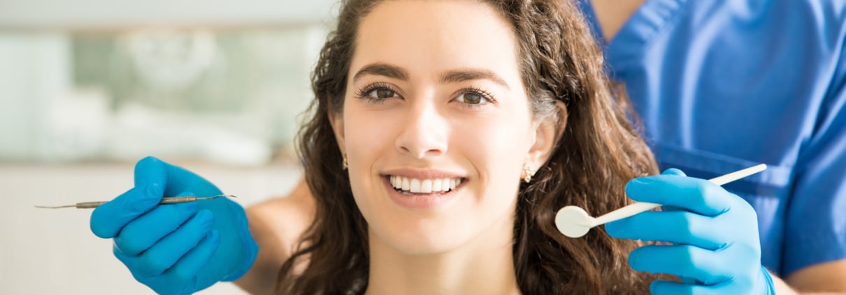 Smile Makeovers Tampa: Veneers, Invisalign & Whitening